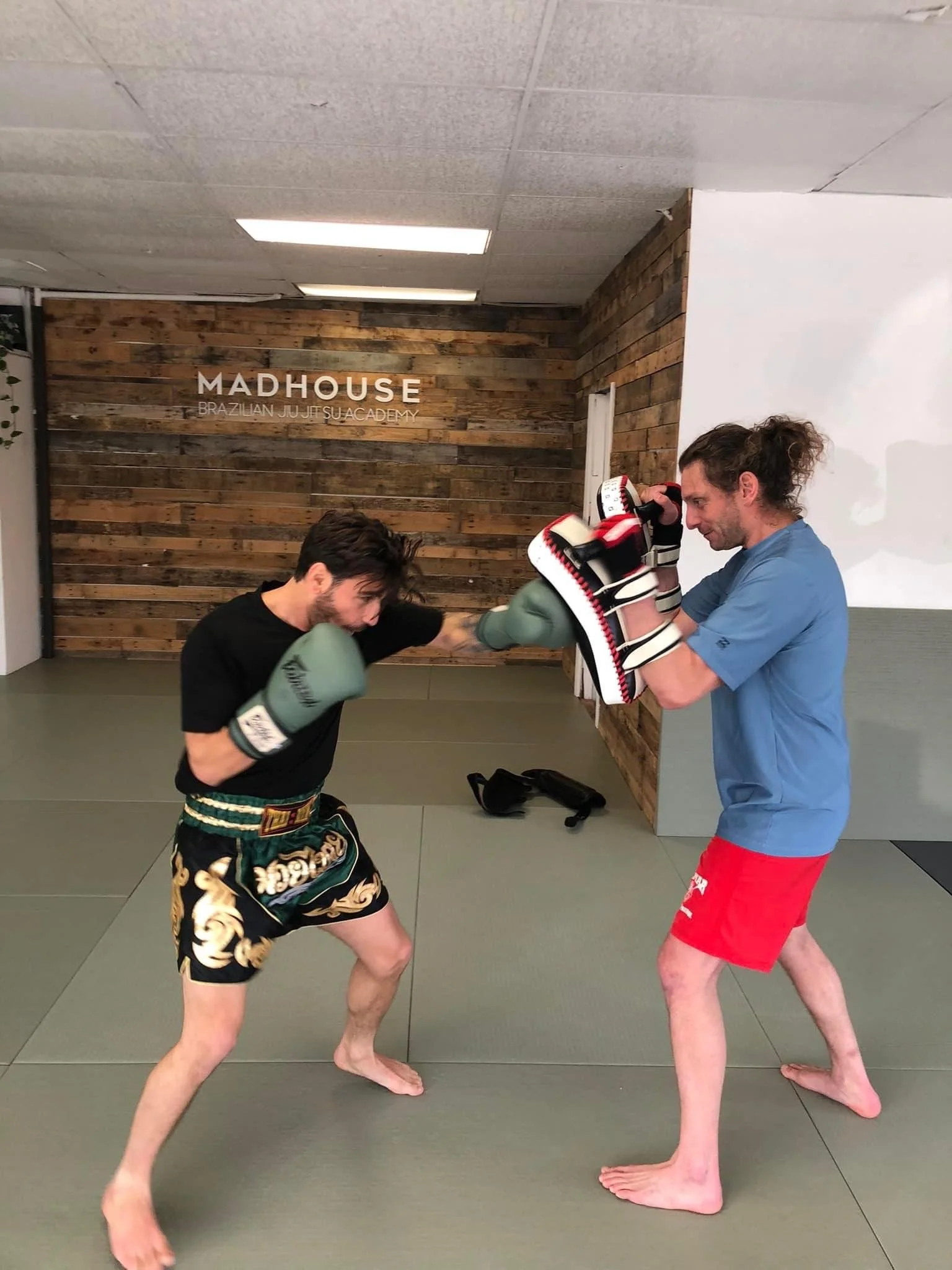 Mike Forgie doing Muay Thai pad work at Madhouse gym
