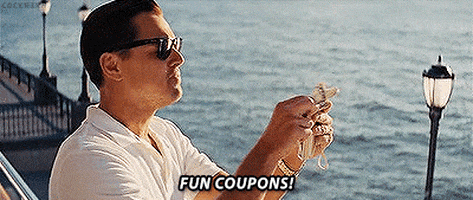 Leonardo DiCaprio in The Wolf of Wall Street holding a stack of Fun Coupons